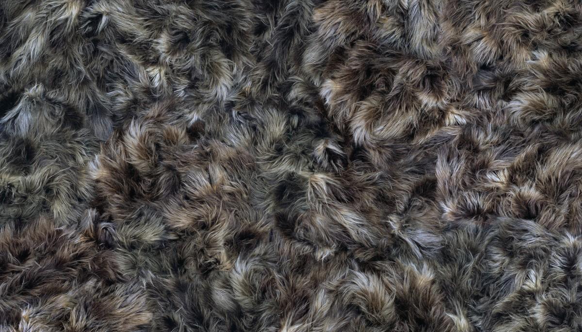 A composite image of dark colored fur. 