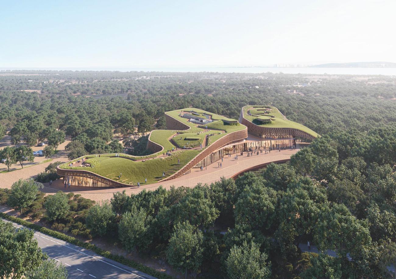 Parametric low-profile building with a green roof.