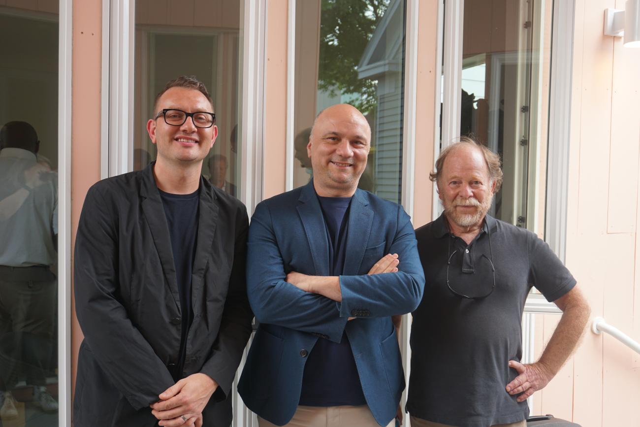 photo of three men standing together