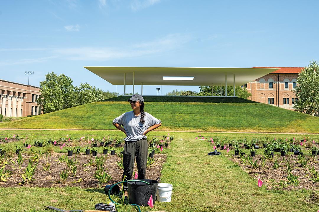 Woman standing on grass